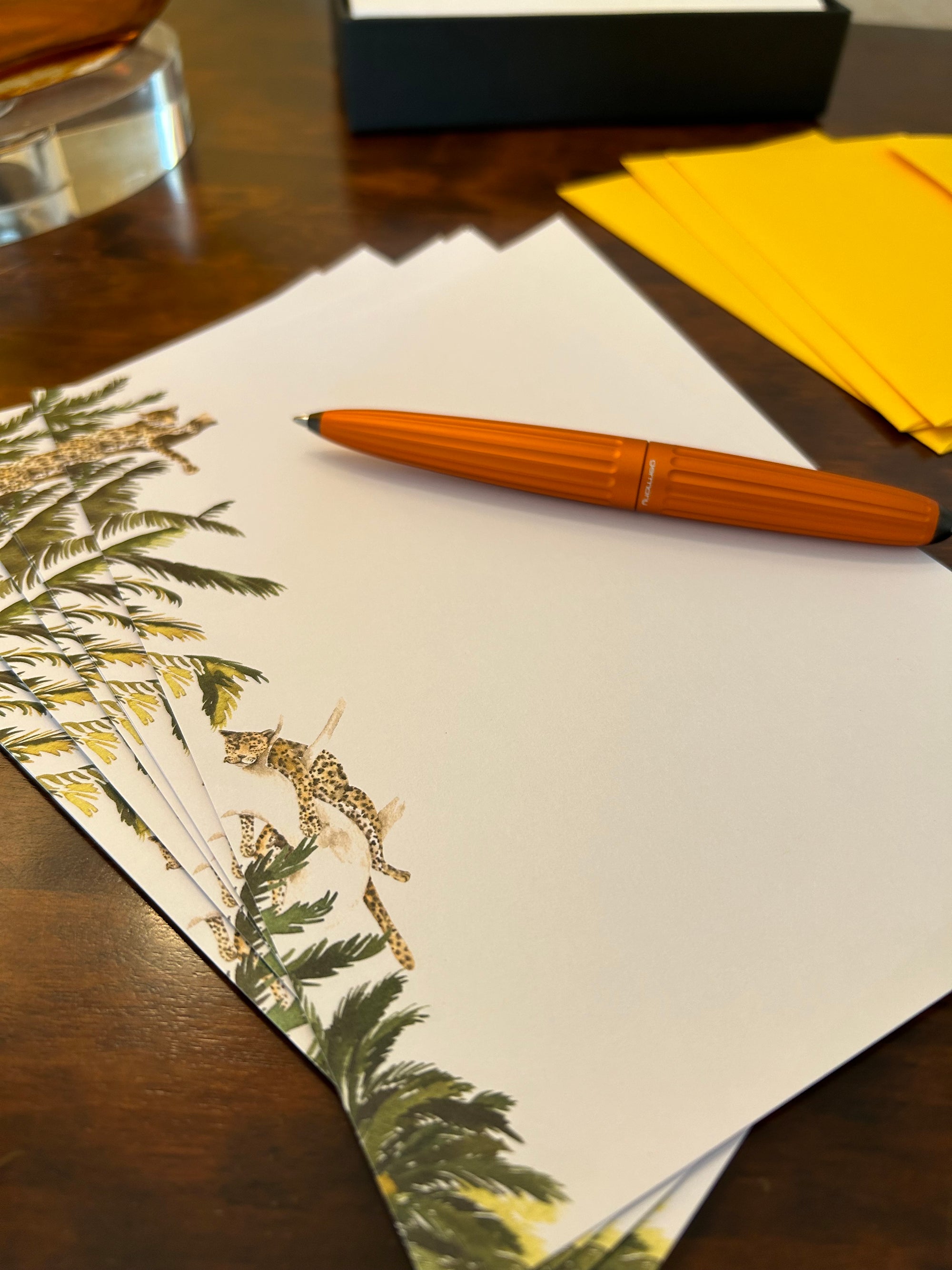 a pen sitting on top of a piece of paper