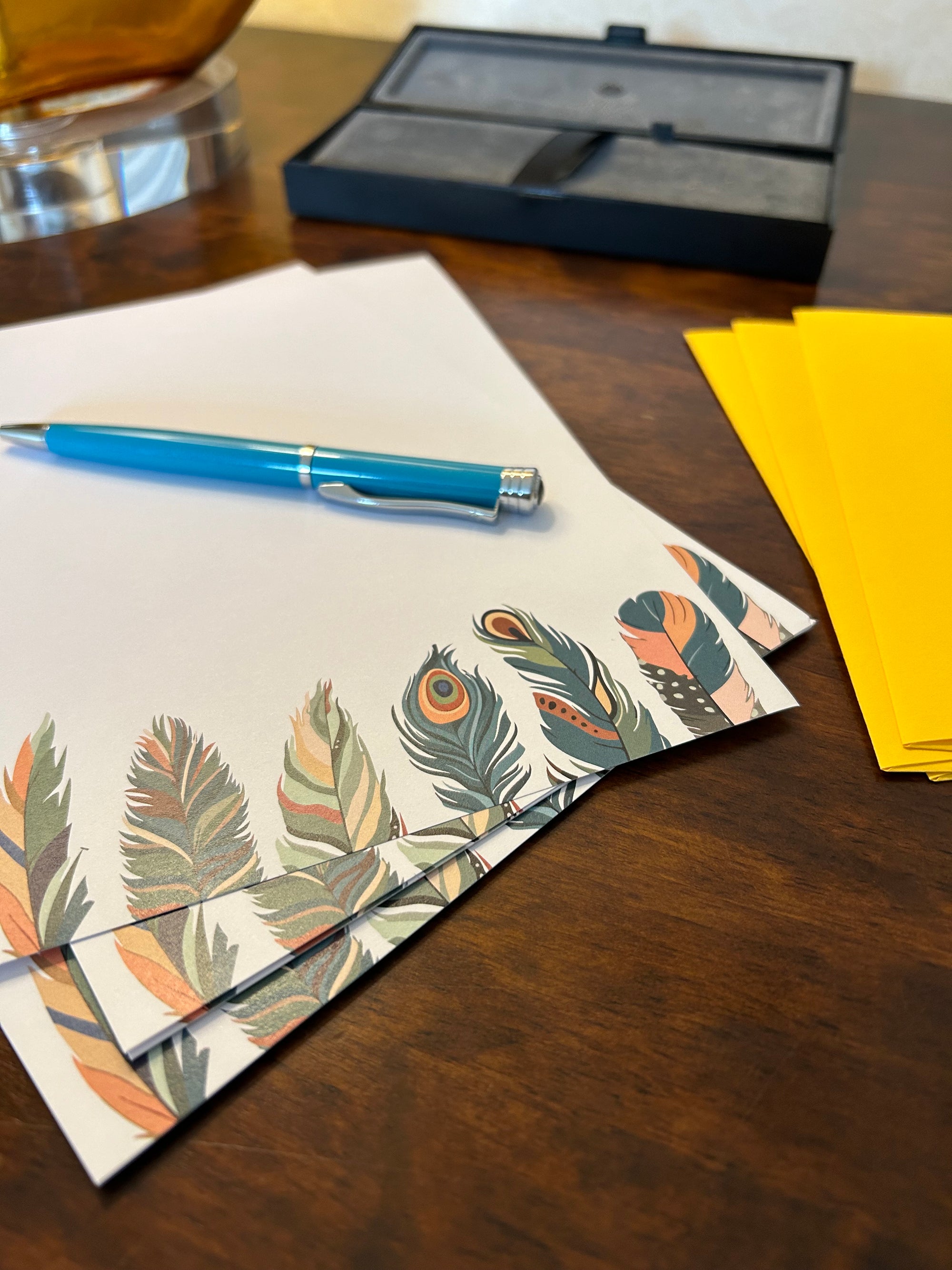 a pen and some papers on a table