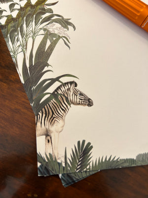 a close up of a paper with a zebra on it