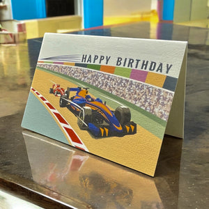 a birthday card with a racing car on it