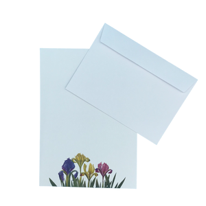 two white envelopes with flowers on them